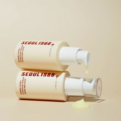Cosmetolux K-SECRET SEOUL 1988 Serum with retinal liposomes and black ginseng, featuring a clear bottle with dropper applicator.