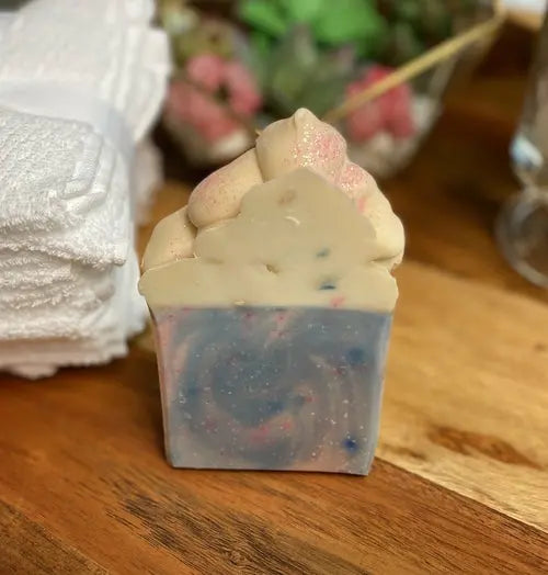 Creamy lather Cotton Candy Soap by Cosmetolux showing smooth, fluffy soap with a pastel pink color and soft texture.