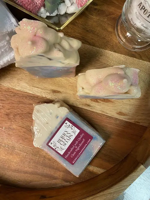Creamy Cotton Candy Soap by Cosmetolux with lathered foam and soft pastel pink and blue swirls in a close-up shot.