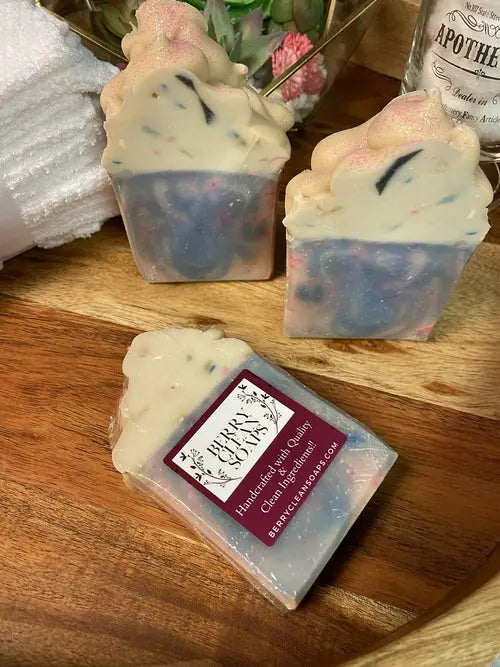 Creamy Cotton Candy Soap by Cosmetolux with a rich lather, showcasing a soft pink soap bar on a white background.