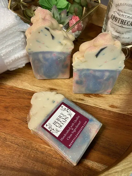 Creamy cotton candy soap by Cosmetolux with rich lather, shown in a close-up image highlighting its soft pink color and smooth texture.