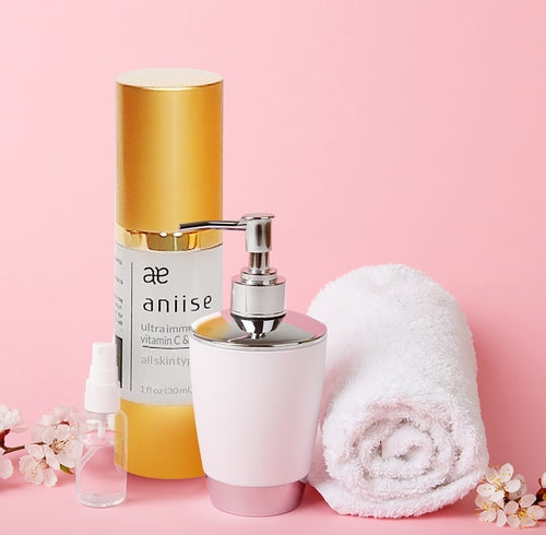 Cosmetolux Ultra-Immune Vitamin C Serum bottle with dropper, highlighting brightening skincare product for immune support.