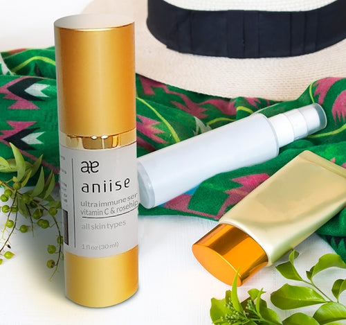 Cosmetolux Ultra-Immune Vitamin C Serum bottle and dropper, showing clear liquid serum in a sleek glass container.